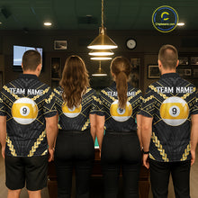 Load image into Gallery viewer, Back view of pool players wearing matching black and gold tribal billiard shirts in a game room.