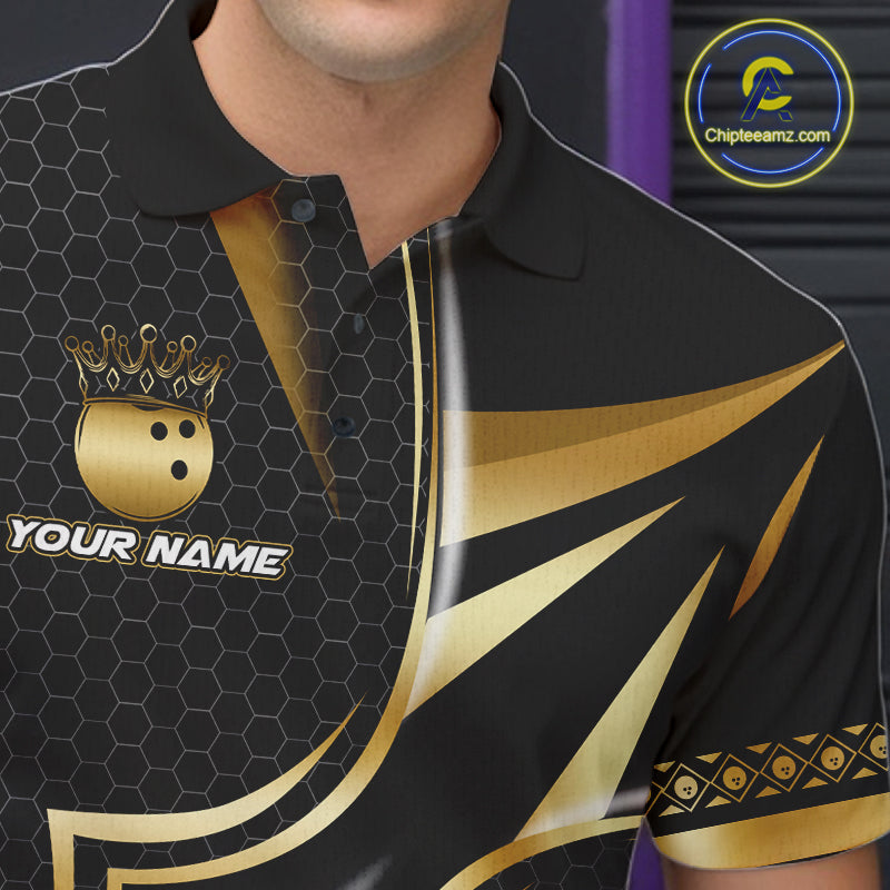Close up of collar, chest and button details on a black and gold bowling ball men's bowling polo shirt.