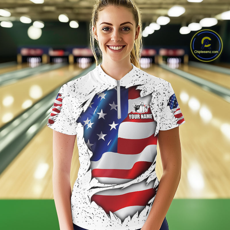Woman wearing a white grunge American flag quarter zip bowling shirt front view, personalized bowling team apparel.