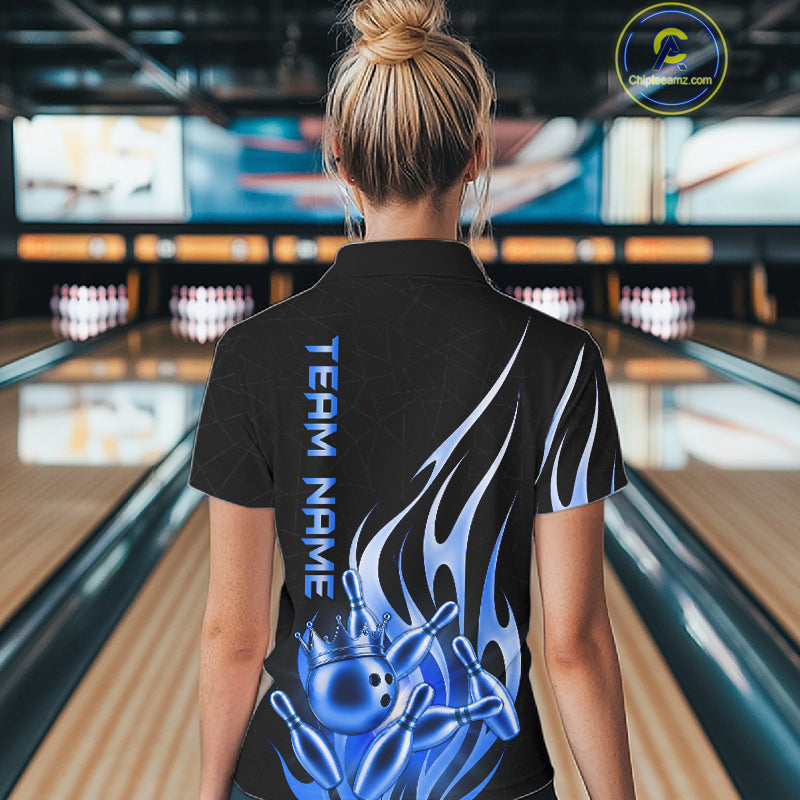 Back view of woman wearing a black and blue bowling ball crown bowling polo shirt.