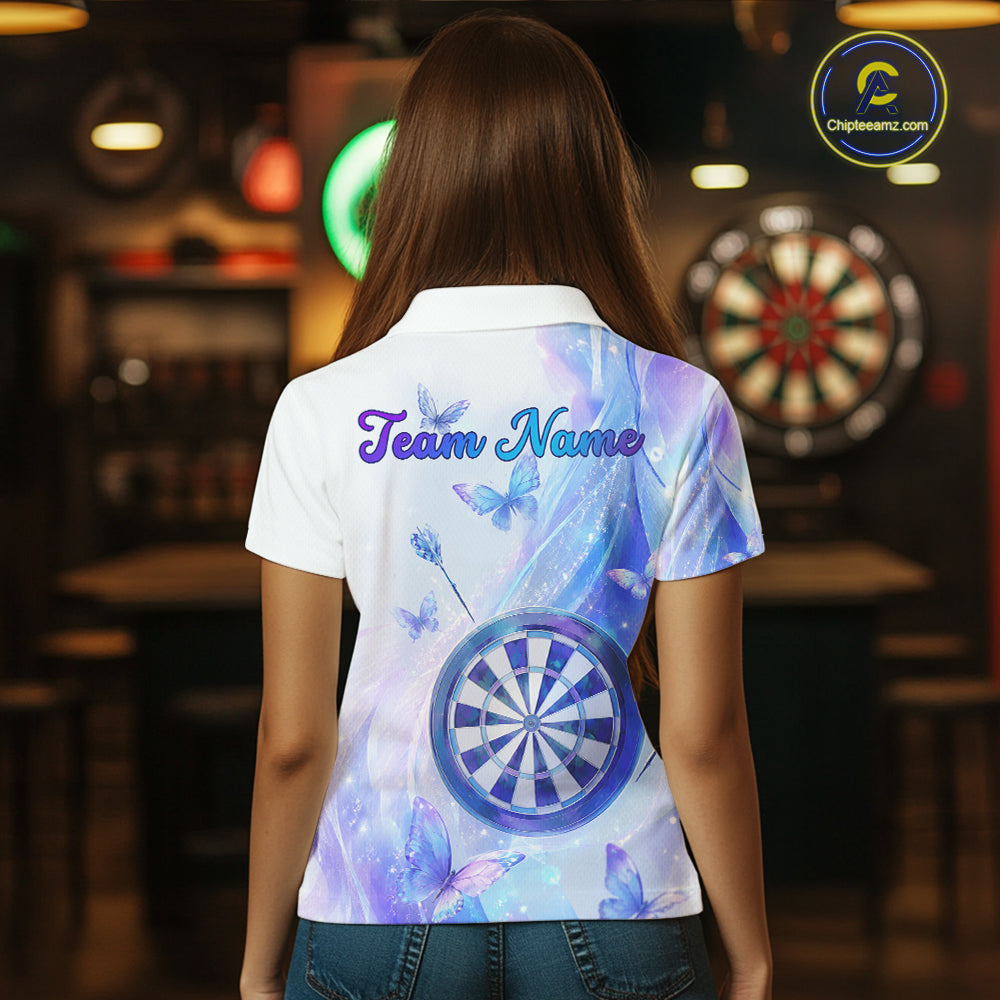 Person wearing a shirt with a dartboard design and 'Team Name' text in a room with dartboards.