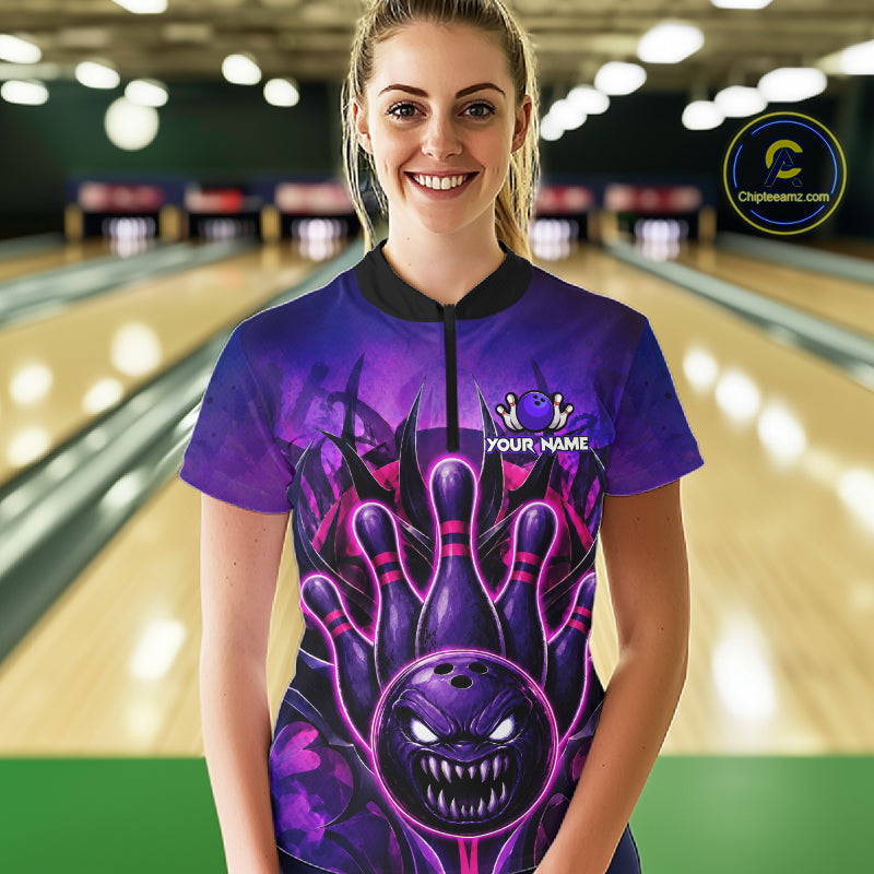 Woman wearing purple neon monster bowling quarter zip shirt front view.