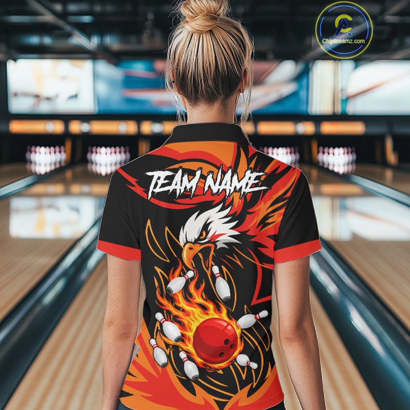 Woman wearing black and orange flame eagle bowling polo shirt back view.