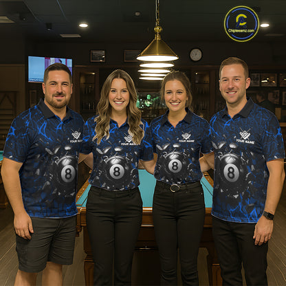 Pool team wearing matching blue crack billiard jerseys during tournament matches front view.