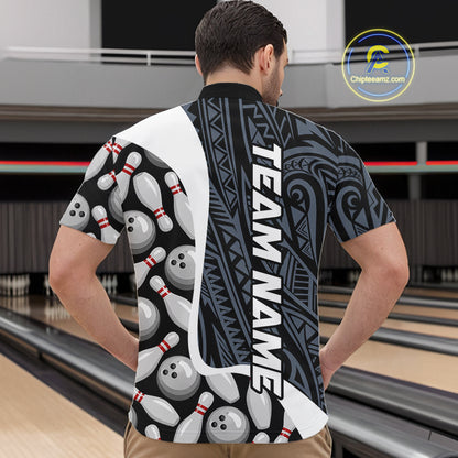 Back view of man wearing a blue tribal pattern bowling quarter zip shirt in a bowling alley.