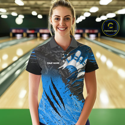 Woman wearing personalized black and blue eagle bowling team jersey polo shirt featuring black and blue eagle artwork, front view.