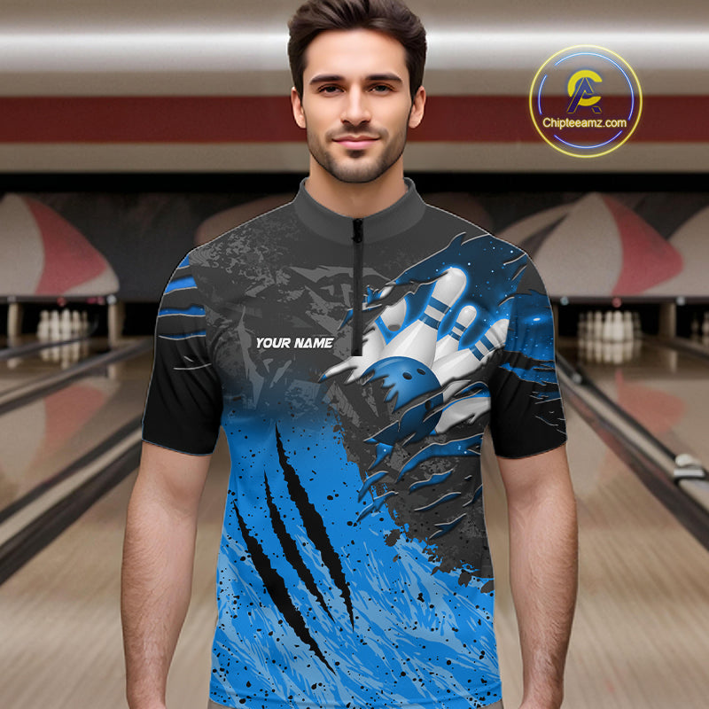 Man wearing personalized black and blue eagle bowling team jersey quarter zip shirt featuring black and blue eagle artwork, front view.