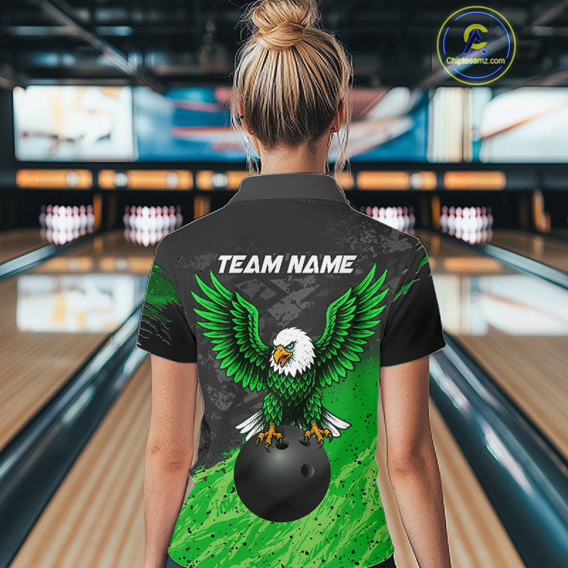 Woman wearing personalized black and green eagle bowling team jersey quarter zip shirt featuring black and green eagle artwork, front view.