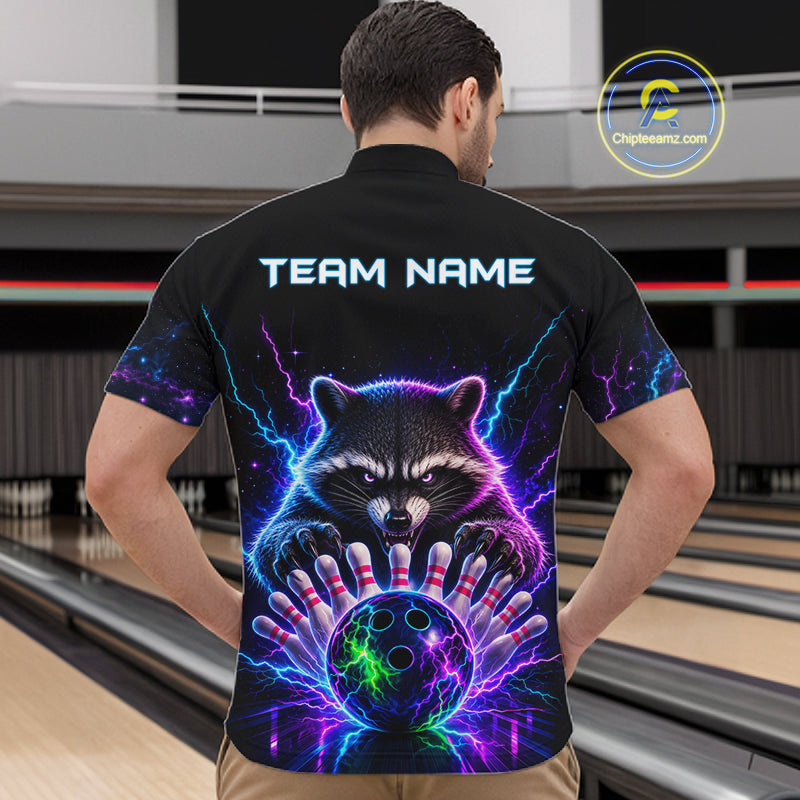 Back view of man wearing a neon raccoon bowling quarter zip shirt in a bowling alley.