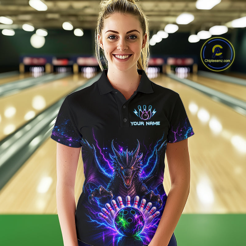 Woman wearing a neon dragon bowling polo shirt at a bowling alley front view.
