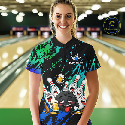 Woman wearing blue and turquoise drunk bowling balls bowling quarter zip shirt front view.