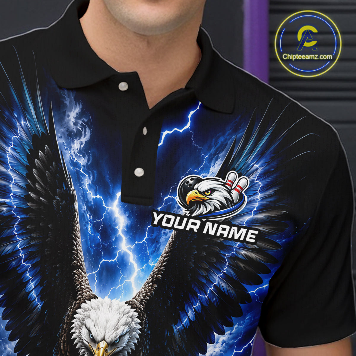 Close-up of a blue thunder lightning eagle bowling polo shirt collar, buttons, and eagle artwork.