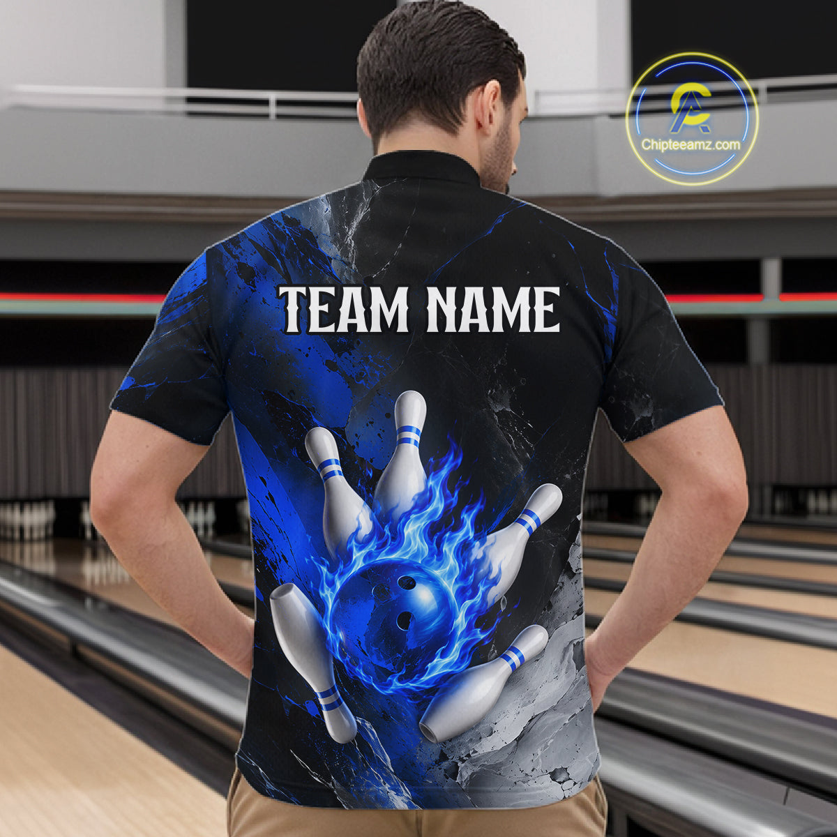 Man wearing black and blue flaming bowling quarter zip shirt back view.