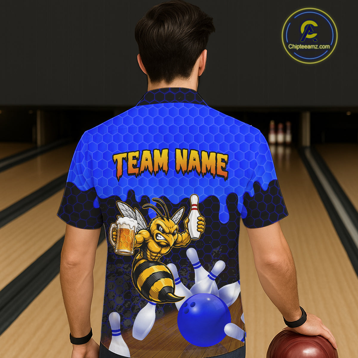 Male model wearing the Black and Blue Funny Bee Beer Bowling Hawaiian shirt with funny bee graphics, beer mug, black and blue tropical bowling design, back view
