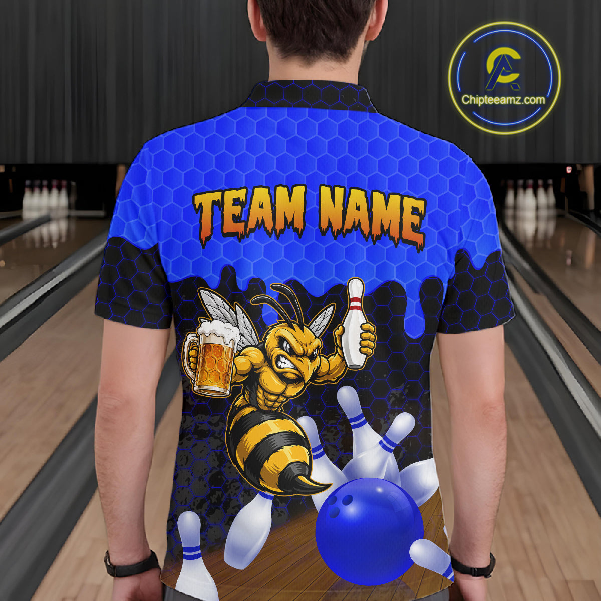Male model wearing the Black and Blue Funny Bee Beer Bowling polo shirt featuring blue hexagon bowling graphics, back view