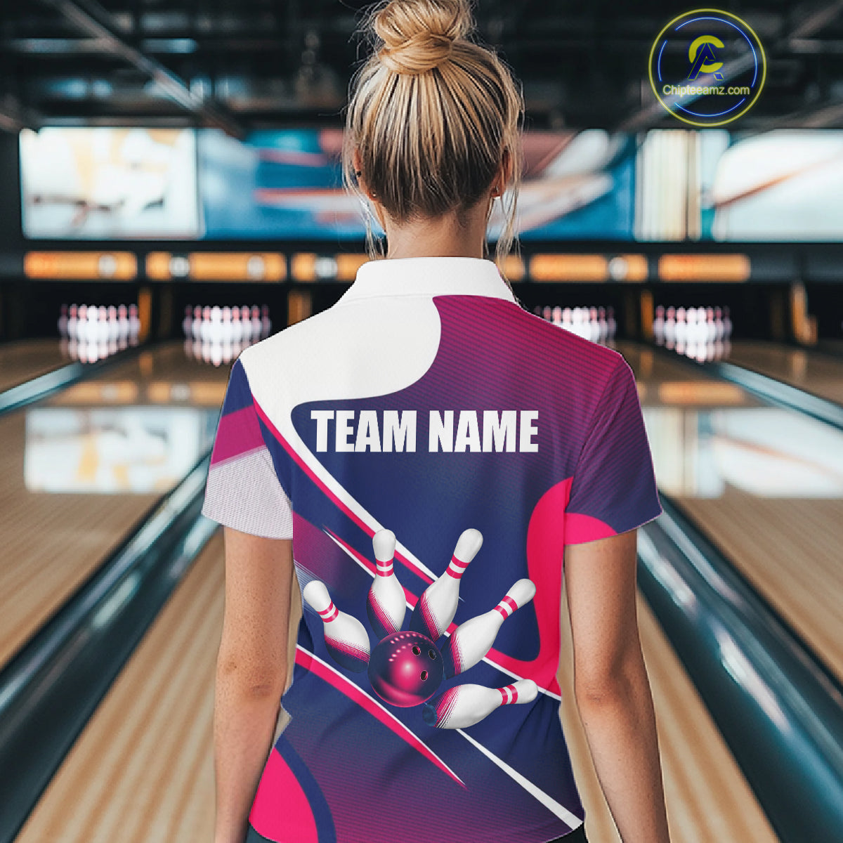 Female bowler wearing white, blue and pink bowling jersey during league play, custom bowling apparel for competitive athletes, bowling enthusiasts and women's sports teams, symbolizing confidence and sportsmanship.