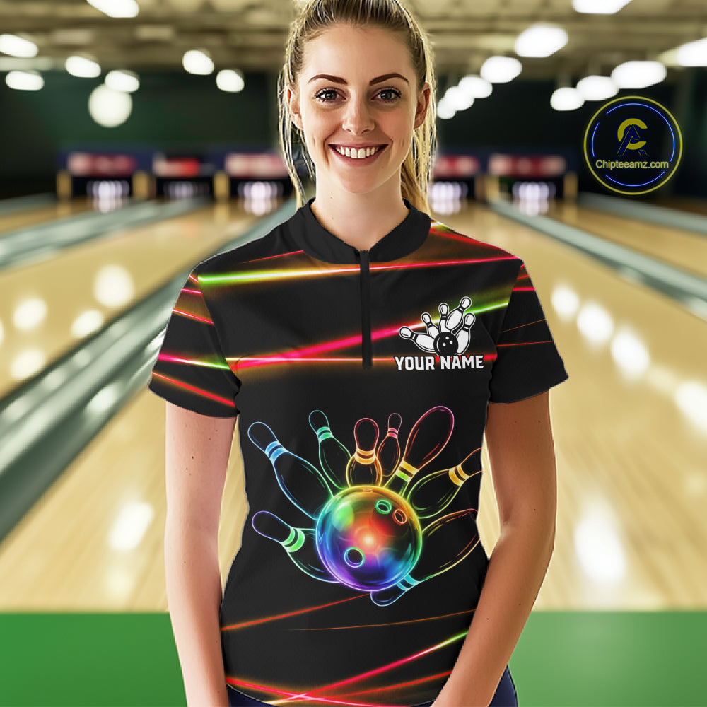 Female bowler wearing Orange and Green Neon rainbow bowling jersey, custom bowling team shirt, colorful bowling league apparel