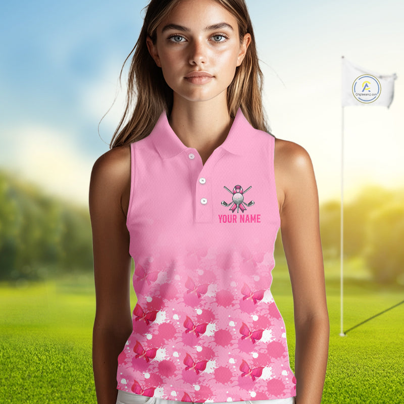 Woman wearing a pink sleeveless golf shirt with a floral pattern on a golf course.