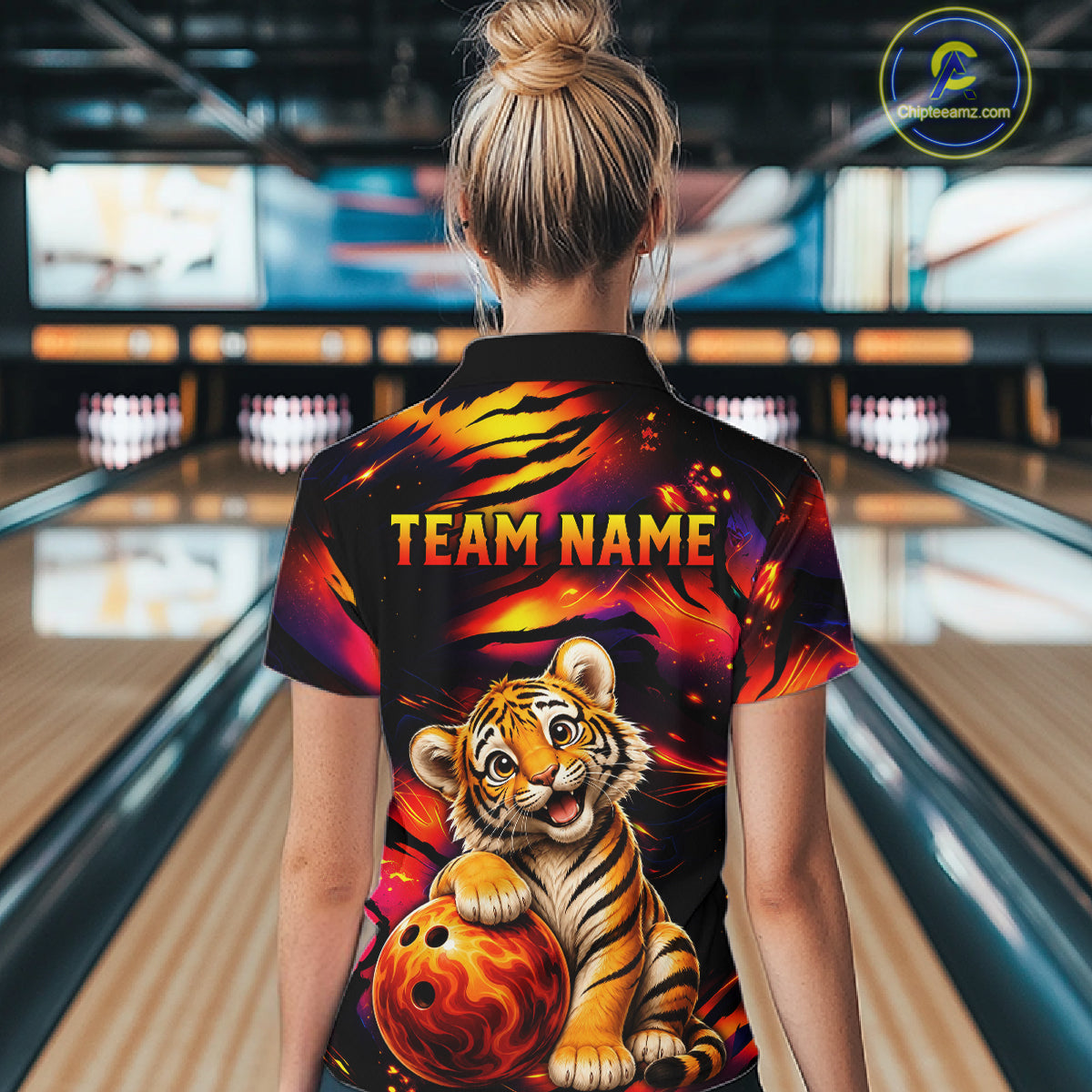 Female bowler wearing tiger fire bowling jersey during league competition, personalized bowling apparel symbolizing power, resilience and competitive spirit.