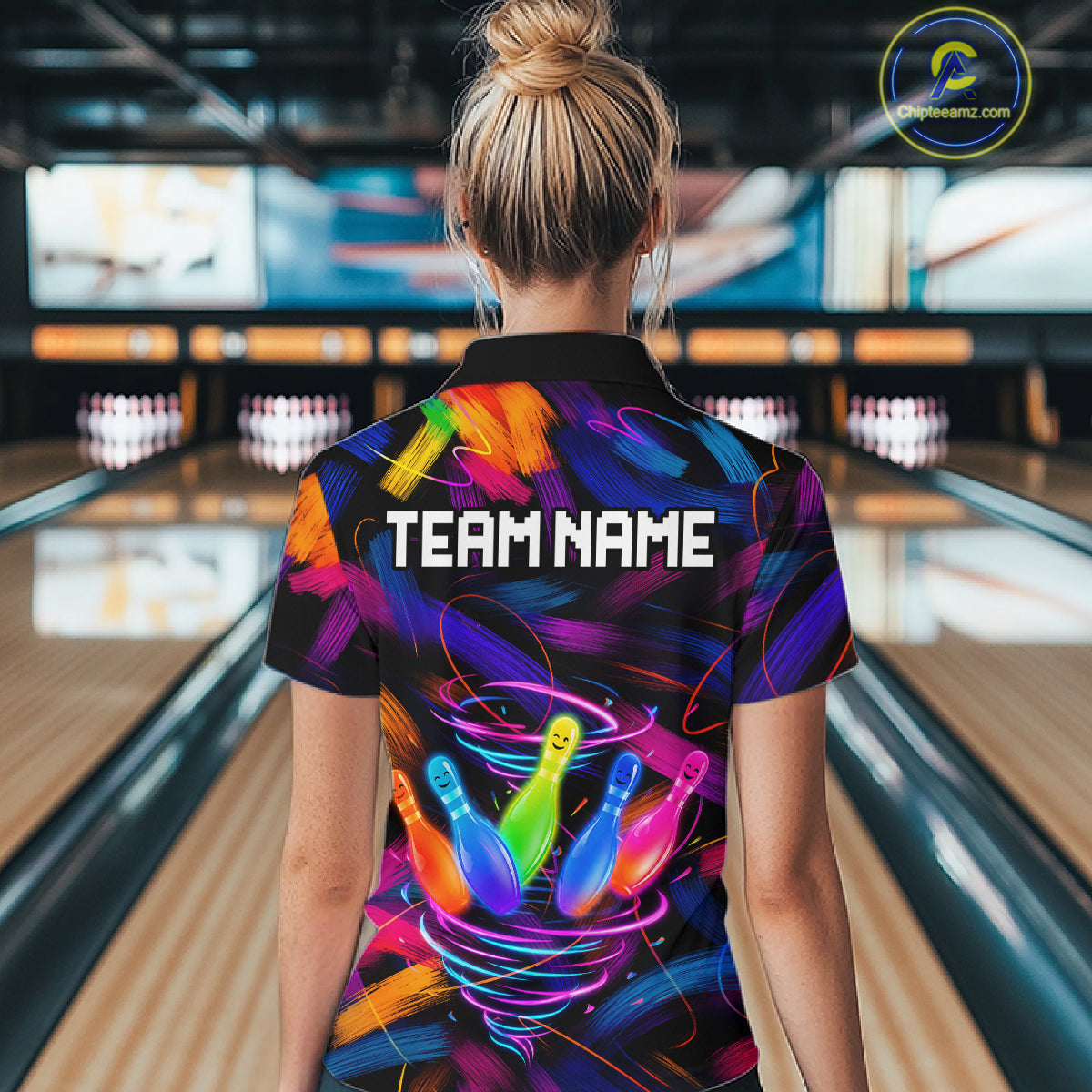 Female bowler wearing Neon Tornado Bowling Pins bowling jersey during tournament and league play